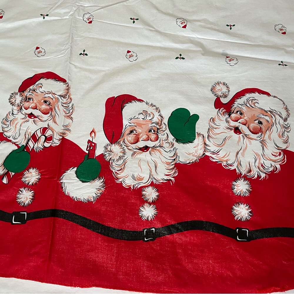 70” x 52” Santa flannel backed plastic Tablecloth